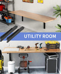 Heavy Duty 24 Inch Folding Shelf Bracket Rock Solid Black Steel Wall Mount used in utility room for tool storage and workspace.