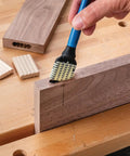 Silicone Glue Brush Set For Beadlock Tenons Ribbed Tenon Shaped Applicators applying glue to wood joint on workbench