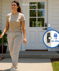 Keyless Fingerprint Door Lock With Keypad Deadbolt In Matte Black, auto locking feature shown with woman walking dog at home.
