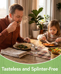 Father and child using Your Go To 100 Percent Bamboo Utensils Set With 50 Forks, 25 Spoons, 25 Knives at dining table