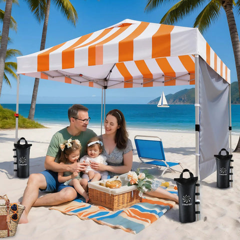 Family under striped canopy on beach with Heavy Duty Sand Bags for Canopy Legs, Portable Tent Weights Set of 4, Windproof Anchors