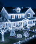 House decorated with Extra Long 98.5Ft 300 LED String Lights Indoor Outdoor Plug In Waterproof Fairy Lights With 8 Modes
