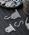 14 Piece RV Awning Hook Set For Lights And Camping Gear S Shaped Gray Hangers with Hook Holders on black surface