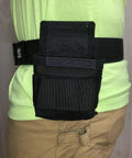 Side view of person wearing Pro Flex Tape Measure Pouch For Tool Bags And Vests Made In USA Durable Grab And Go Clip on belt.