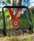 Mini Gong Steel Shooting Target For.22 Caliber With Stand in green grass