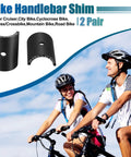 2 Pair Bike Handlebar Shim 25.4 To 31.8mm Adapter Kit for MTB Road Bikes with cyclists in background