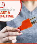 Person holding a bright orange plug of the Orange Indoor Outdoor Extension Cord 18 Feet With 1 Outlet 3 Prong 16 Gauge