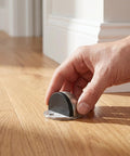 Hand installing Stainless Steel Floor Door Stopper 2 Pack Hemispherical Anti Collision Door Stop for Safety No Drill on wood floor