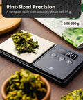 Ultra Precise Pocket Scale With 300 Gram Capacity And 0.01 Gram Increments, displaying measurement of herbs, matte black design