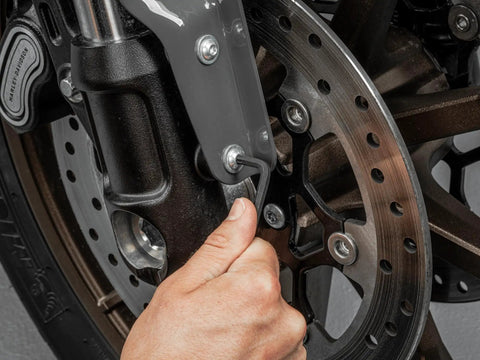 Using Star L Key Set With Holder, 13 Piece T6 Through T50 for bike maintenance on brake caliper, showing precise tip geometry