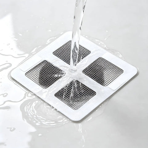 Hair Drain Stickers 100 Pcs Disposable Peel Stick on wet surface, catching hair with adhesive backing.