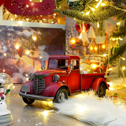 Iron Classic Red 12 Inch Pickup Truck Figurine For Home Decor with Christmas lights under a decorated tree