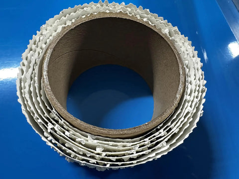 Self-Adhesive Pre-Textured Popcorn Ceiling Patch Roll for Easy DIY Repairs, 2 In by 5 Ft, close-up on blue background