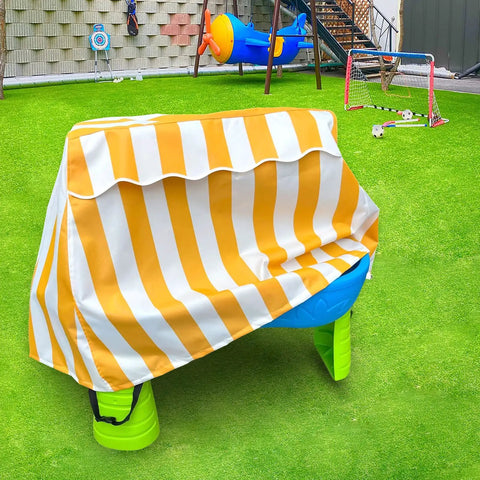 Kids Outdoor Water Table Cover Weatherproof Dustproof UV Shield on a 2 tier water table surrounded by toys in a play area