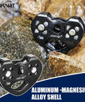 Beefy Heavy Duty Zip Line Pulley 8 To 13mm Climbing Pulley with Durable Aluminum and Stainless Steel Bearings on rocks.