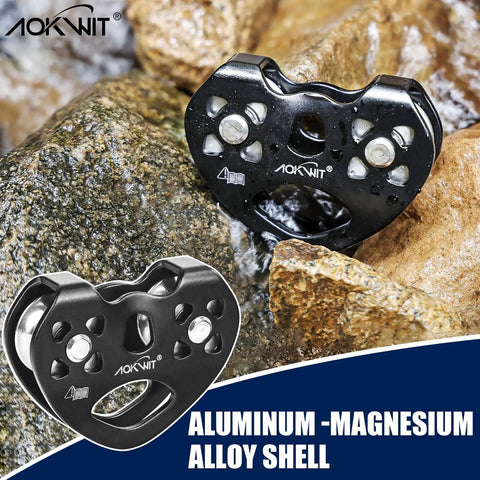 Beefy Heavy Duty Zip Line Pulley 8 To 13mm Climbing Pulley with Durable Aluminum and Stainless Steel Bearings on rocks.
