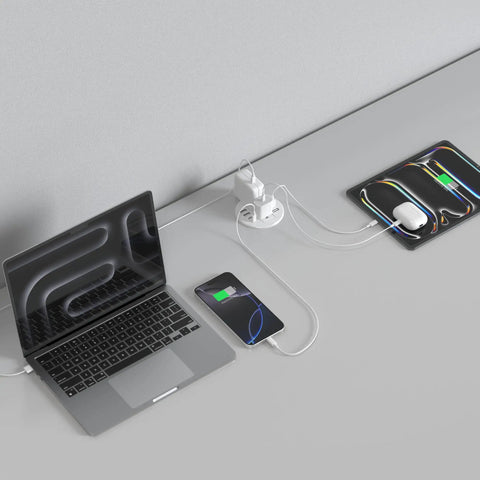 Sleek 3.15 Inch Desktop Power Grommet Featuring Two AC Outlets And Eight Fast Charge USB Ports to connect laptop and phone.