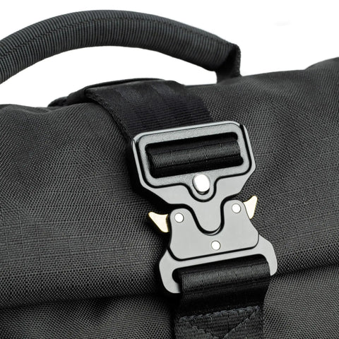 Close-up of Roll Top 30L Camera Backpack With Laptop Sleeve And Rain Cover Asphalt Black buckle and handle detail
