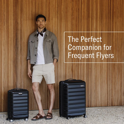 Two black Samsonite Omni 2 24-inch medium hardside luggage with 360-degree spinner wheels