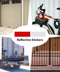 Reflective stickers on garage, bicycle, truck, and gate for enhanced visibility.