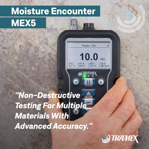 Moisture Encounter MEX5 No-Nonsense Digital Moisture Meter showing display screen and buttons in a hand against tile background.