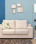 Sleek Gray Etagere Floor Lamp With Linen Shade And Built-In Shelves beside a beige sofa in a modern living room.