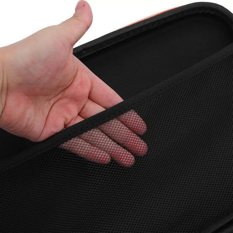 Close-up of hand accessing mesh grid pocket in Rugged EVA Tool Storage Case for Drill Driver and Grinder