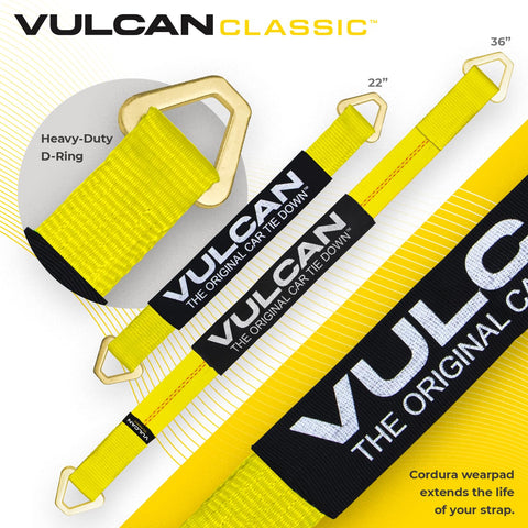 Complete Axle Strap Tie Down Kit With Wire Hook Ratchet Straps In Classic Yellow Includes Four 22 Inch And Four 36 Inch Axle Straps Plus Four 15 Foot J Hook Ratchet Straps Heavy Duty 2 Inch Webbing And Cordura Wear Pads For Extra Durability, yellow axle strap with D-ring and wear pad.