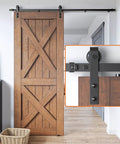 6 Foot Lite Sliding Barn Door Hardware Kit Heavy Duty Combination Track Included Easy To Install Manual Carbon Steel Upgrade Low Clearance 265 Lb Capacity Black Finish shown with wooden door installed in hallway.