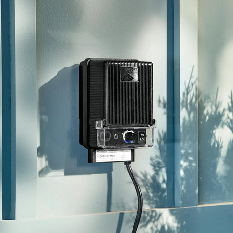 Standard Series 120W Transformer For Outdoor Lighting on wall, black plastic, wet location rated, 15E120BK model, epoxied finish.