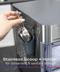 Stainless steel ice scoop in magnetic holder mounted on the side of a GE Profile Opal Nugget Ice Maker