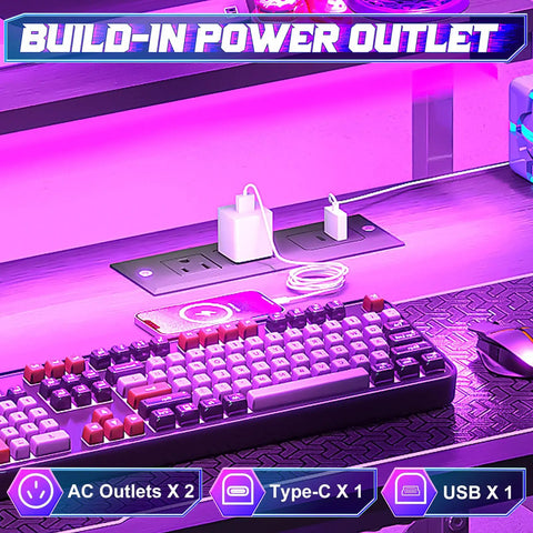 Close-up of 33.5 Inch Compact Gamer Desk with Remote RGB LED Lights and 3 in One Power Hub showing keyboard, USB and Type-C outlets.