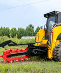 Workhorse Skid Steer Trencher Attachment with beefy steel frame and tungsten carbide teeth in operation on grassy field