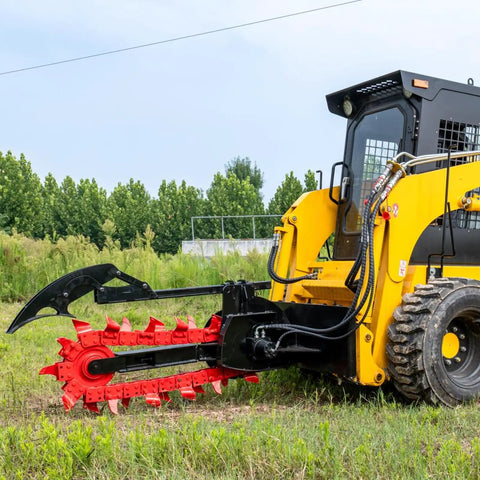 Workhorse Skid Steer Trencher Attachment with beefy steel frame and tungsten carbide teeth in operation on grassy field