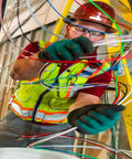 Electrician handling heavy duty building wire stranded copper 12 gauge one conductor 20 amp 600 volt 90 C white 500 ft PVC jacket