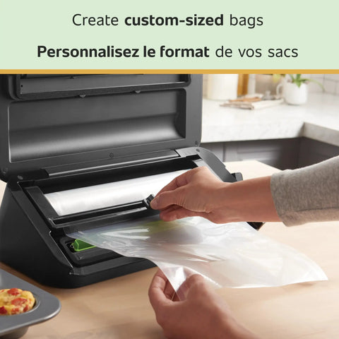 Person using Custom Length Vacuum Sealer Bags Multipack Of 5 Count Rolls For Airtight Food Storage And Sous Vide, Cut To Fit 8 or 11 inch rolls.