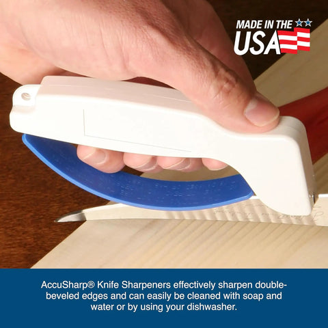 Handheld Tungsten Carbide Knife Sharpener in use on wooden surface, restoring kitchen blades quickly and efficiently.