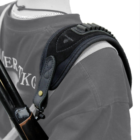 Person with Durable Leather Rifle Stock Cover With Built In Recoil Pad And Cartridge Sling For Calibers on shoulder