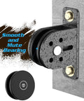 Heavy Duty Silent Pulley Block For Home Gym Lifting Wall Or Ceiling Mount Pulleys With Quiet Dual Bearing Nylon Sheaves 300 KG Load Capacity Durable Stainless Steel Wheel For Lifting Weights And Hoists mounted on a wall showing smooth mute bearing
