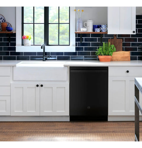 Hella Quiet And Super Spacious Top Control Dishwasher With Plastic Interior And Dry Boost featuring sleek black design in modern kitchen.