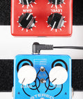 9V Battery Clip Converter Cable For Guitar Effects Pedals with right angle plug connecting to pedalboard