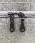 Handy Zipper Pull Replacement Kit For Small Holes With Detachable Tabs, Easy Install, Reusable Repair, 4 Pieces, Black on fabric