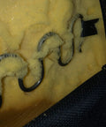 Four Pack Heavy Duty Nine Gauge Recliner Seat Springs measuring nineteen point five inches long showing bent ends inside foam cushions.
