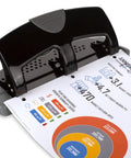 No Sweat Heavy Duty Three Hole Puncher With 20 Sheet Capacity Solid Steel Frame in use with document highlighting ergonomic grip.