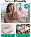 Woman holding Hair Tool Organizer Travel Case For Dyson Airwrap And Shark FlexStyle, heat-resistant mat, wide opening, pink design.