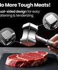 Dual-Sided Meat Tenderizer Tool With Flat Pounder And Textured Surface next to raw steak on black slate.