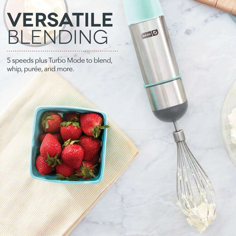 5 Speed 330 Watt Immersion Hand Blender With Stainless Steel Blades And Whisk Attachment For Soups Smoothies And Purees in aqua next to strawberries.