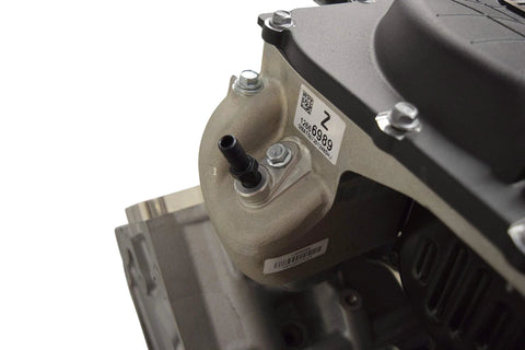ICT Billet vacuum port hose adapter 1/8 NPT on LS-series supercharger; aluminum housing with black barb, close-up view.