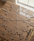 Transparent Acrylic Clock Template Set For Woodworking Router Projects And DIY Wall Dial Stencils on wooden table.