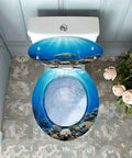 Round Resin Quiet Close Toilet Seat Cover for Bathroom with ocean scene design, adjustable fit, and decorative blue hues.